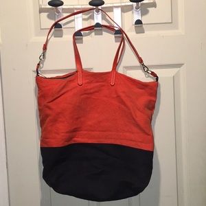Orange and blue gap bag used